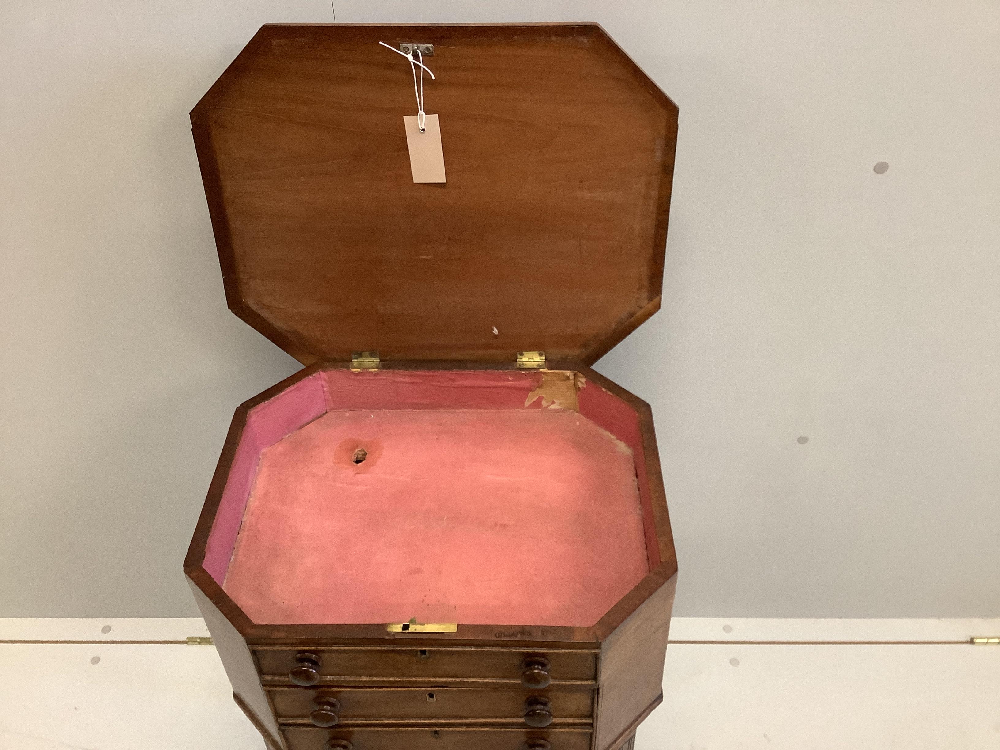 A George III octagonal mahogany hinged top work table, width 49cm, depth 39cm, height 73cm